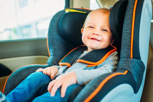 Happy Little Baby Sitting Child Safety Seat Car Looking Camera — стоковое фото
